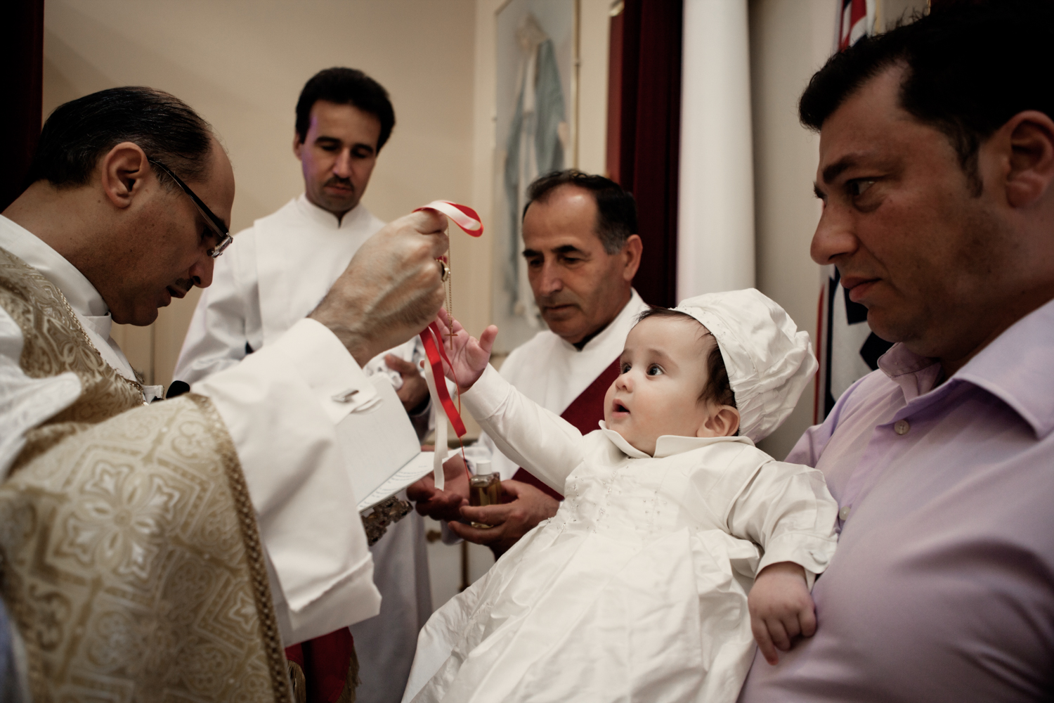 Beautiful christening photos by Mario Zmudzinski at Magnum Studio