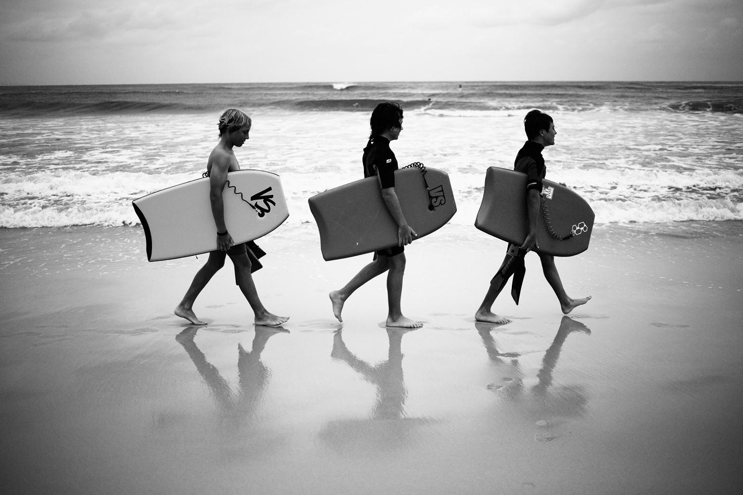 Moments that tell a story by Mario Zmudzinski | Young surfers on the beach