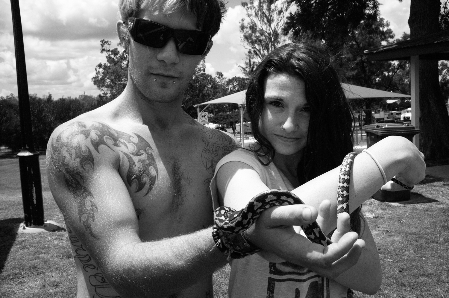 Couple with snake. The art of observation through documentary photography by Mario Zmudzinski