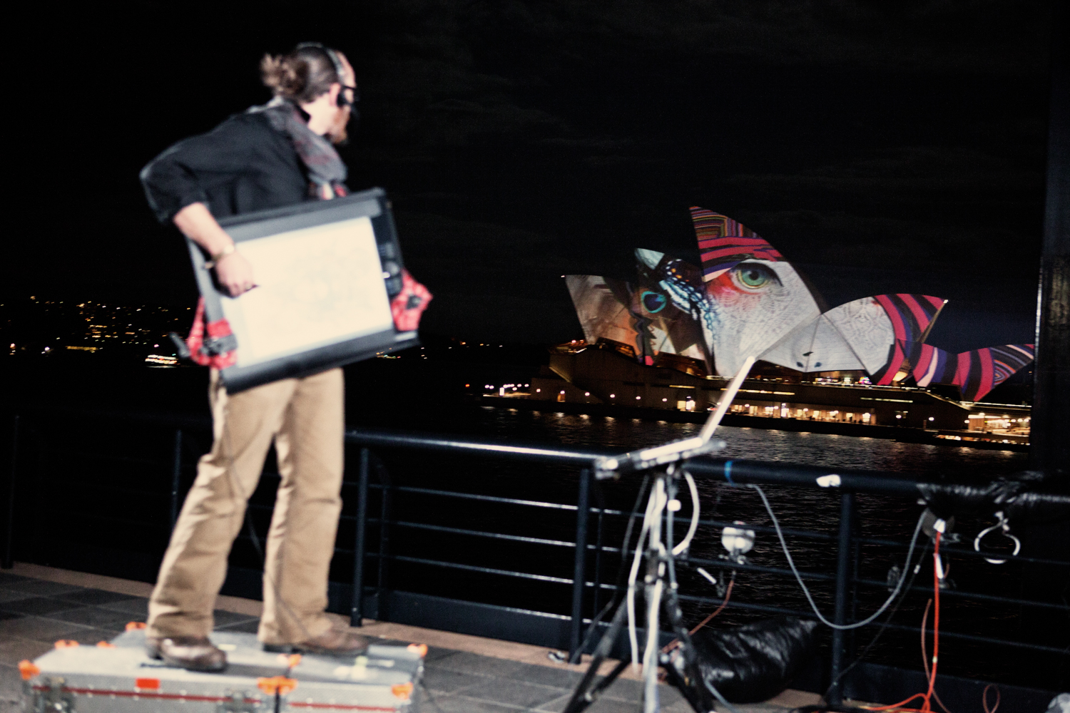 Night view of the illuminated Sydney Opera House by Mario Zmudzinski at Magnum Studio