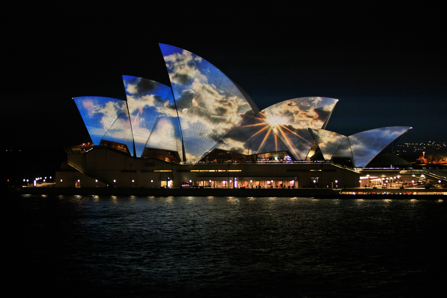 Celebrating with a view of Sydney Opera House by Mario Zmudzinski at Magnum Studio