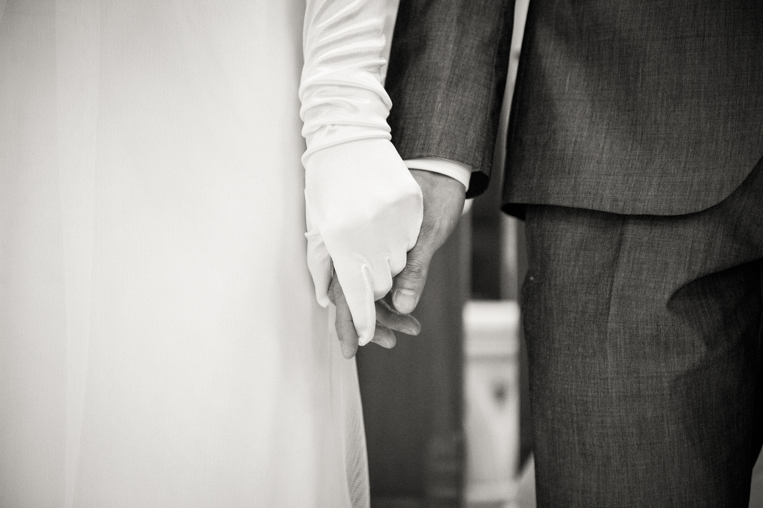 Bride and groom holding hands