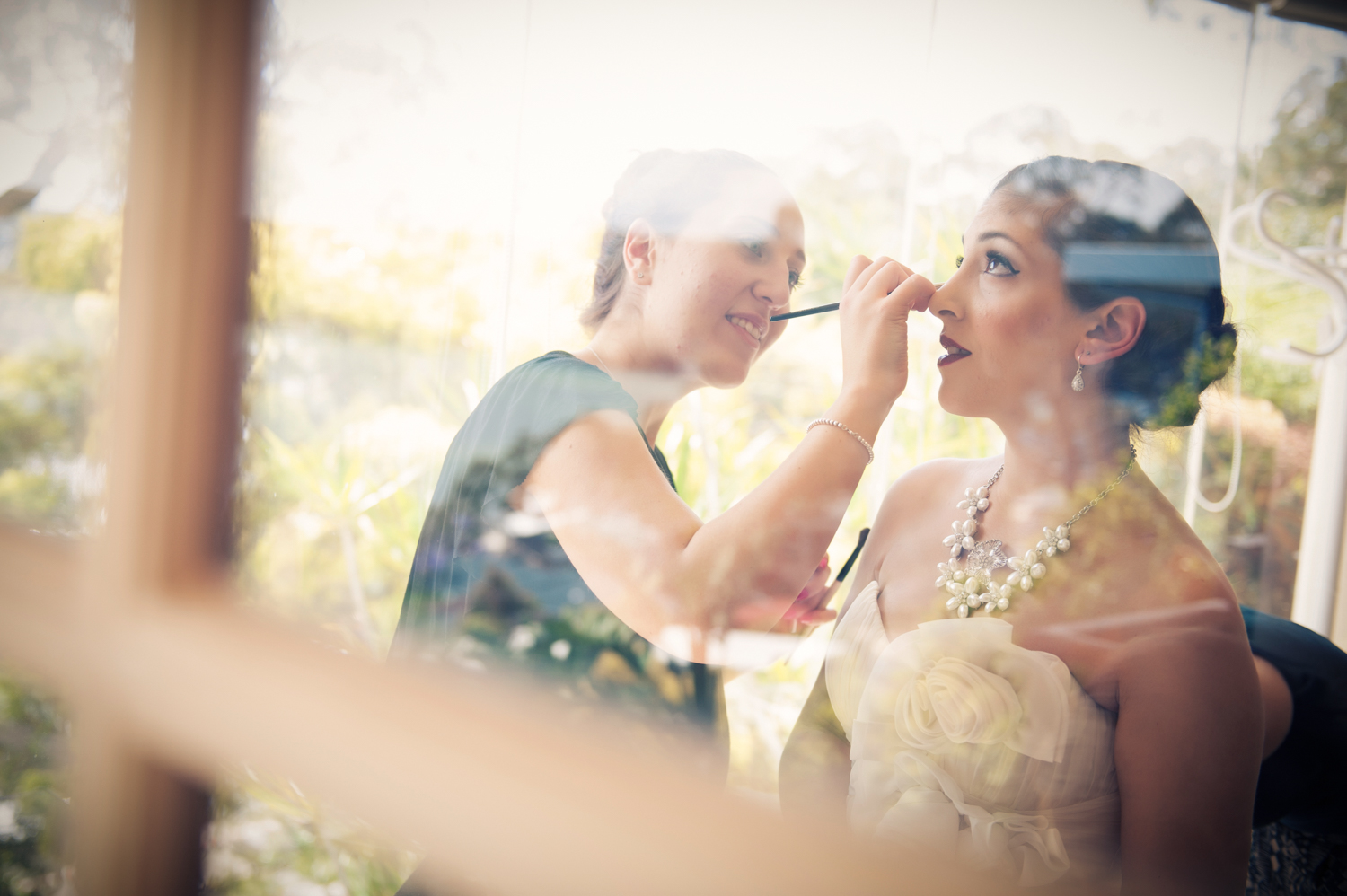 Close-up shot of the bride's makeup artist