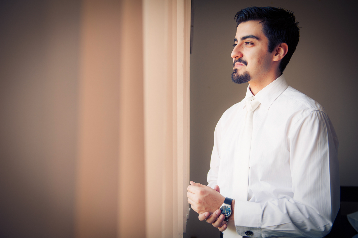 Groom taking a moment to reflect before the wedding ceremony