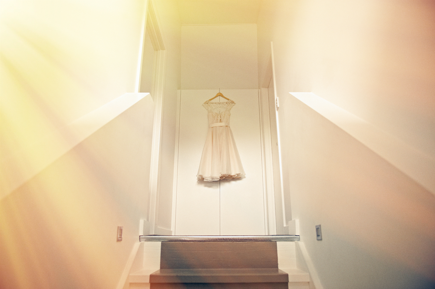 Mario Zmudzinski capturing bride's wedding dress